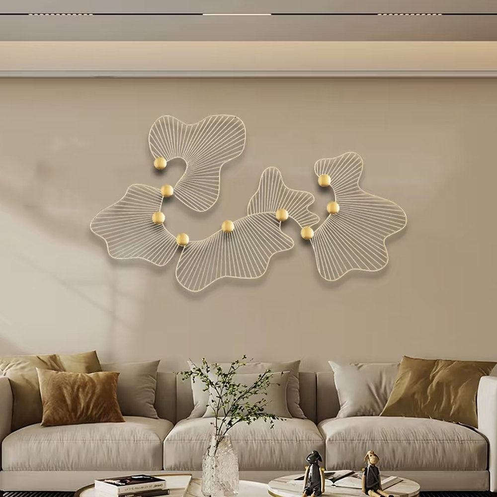 gold-toned ginkgo leaf-inspired linear